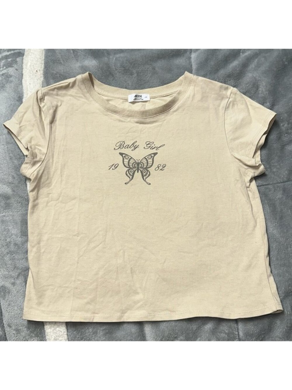Ardene size large crop tan tee. With butterfly design.